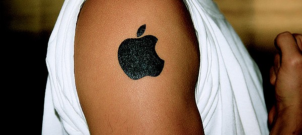 Apple logo tattoo on an Apple fans shoulder